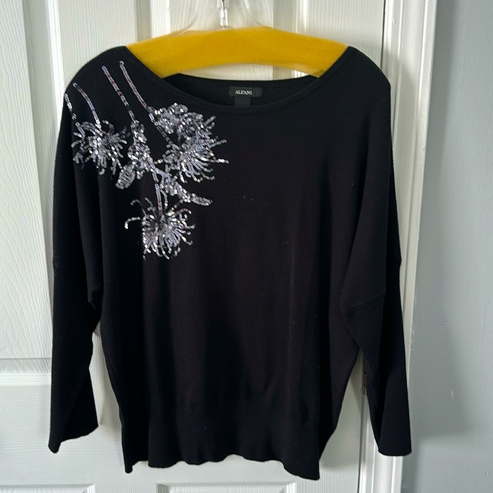 Black long sleeve top, wide neck, sequin design, cinched waist